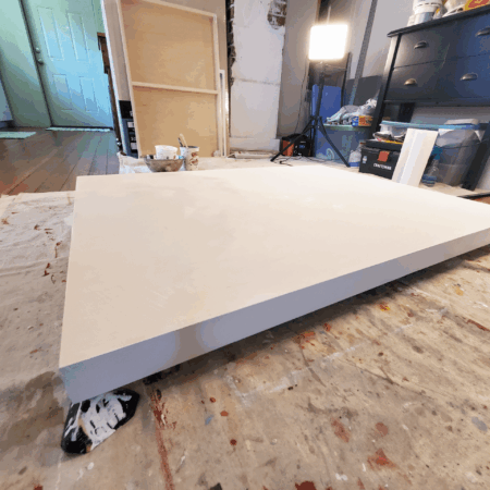 A wooden painting panel that has been primed with a traditional gesso.