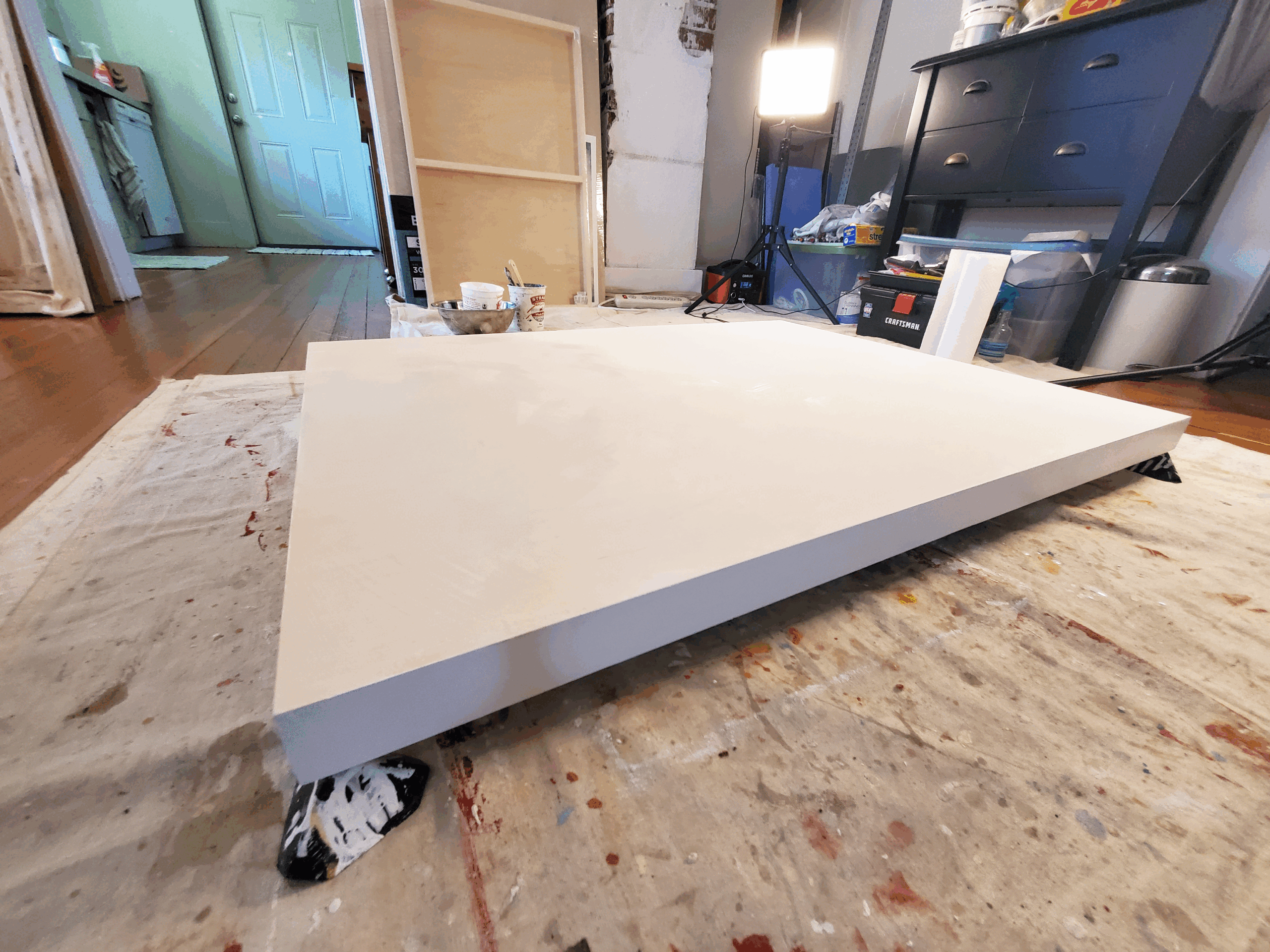 A wooden painting panel that has been primed with a traditional gesso.