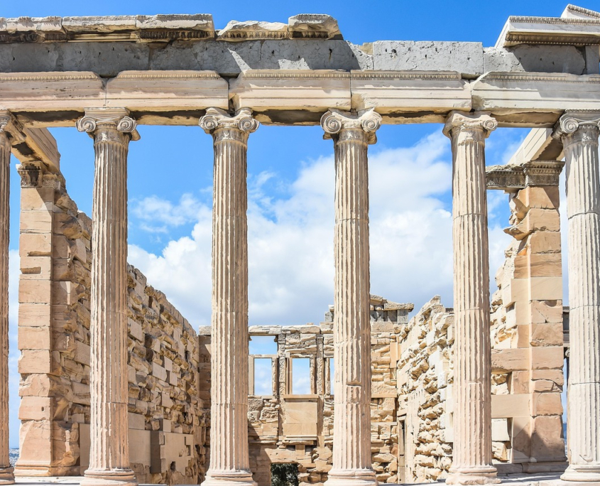 anestiev-acropolis-2725918_1280_scaled Ionic columns of the Erechtheion an ancient Greek temple on the Acropolis of Athens against a blue sky