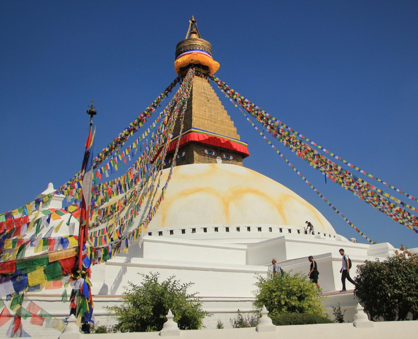 delmee-nepal-908837_1280_scaled The golden spire and painted eyes of Boudhanath Stupa in Kathmandu, strung with prayer flags